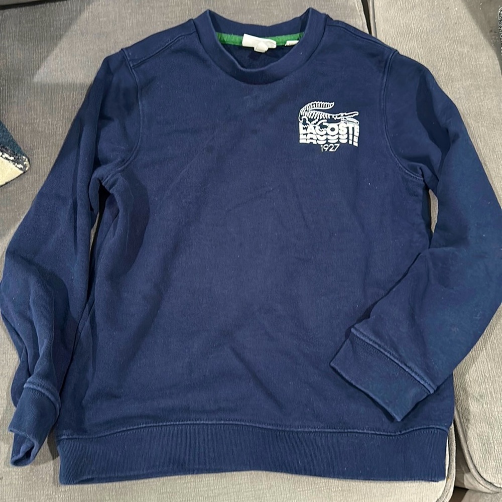Lacoste sweater for a boys size 10. Good condition.